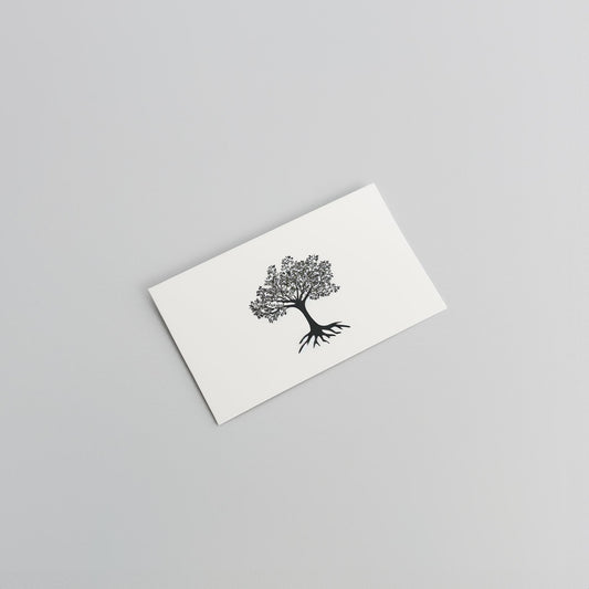 A white Example product card with a minimalist black tree and exposed roots illustration, displayed on a plain light gray surface.